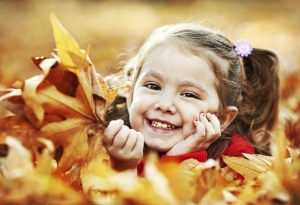You don't have to spend a lot of money to find healthy, fun, family activities for the fall. Just raking the leaves can be a fun event for kids.